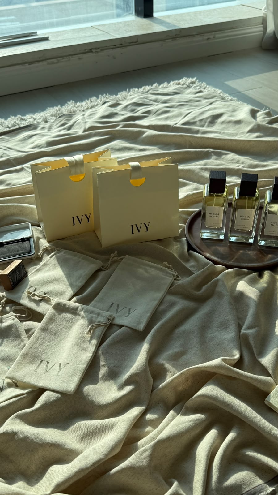 IVY perfume bottles and ivory gift bags